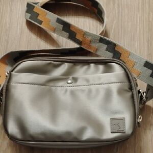 Elegant Beige Shoulder Bag with Patterned Strap